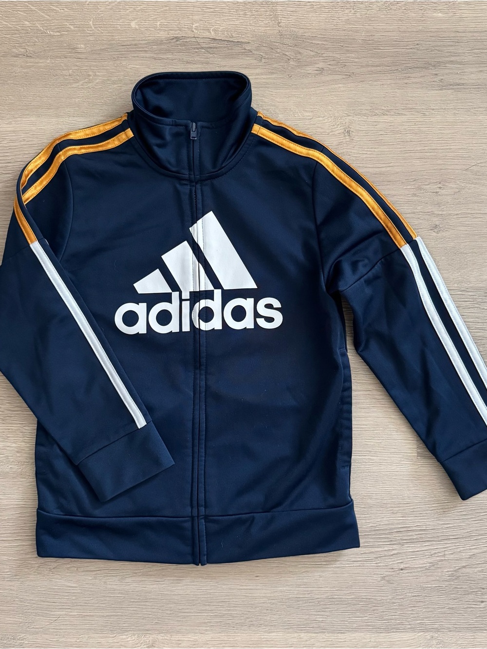 adidas kids Navy track Jacket with White Logo and Gold Shoulder Stripes
